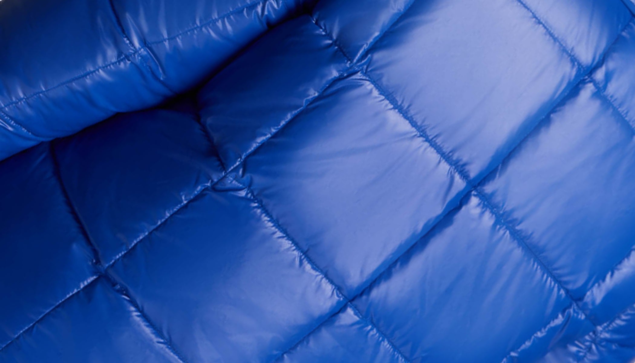 closeup of blue puffer jacket