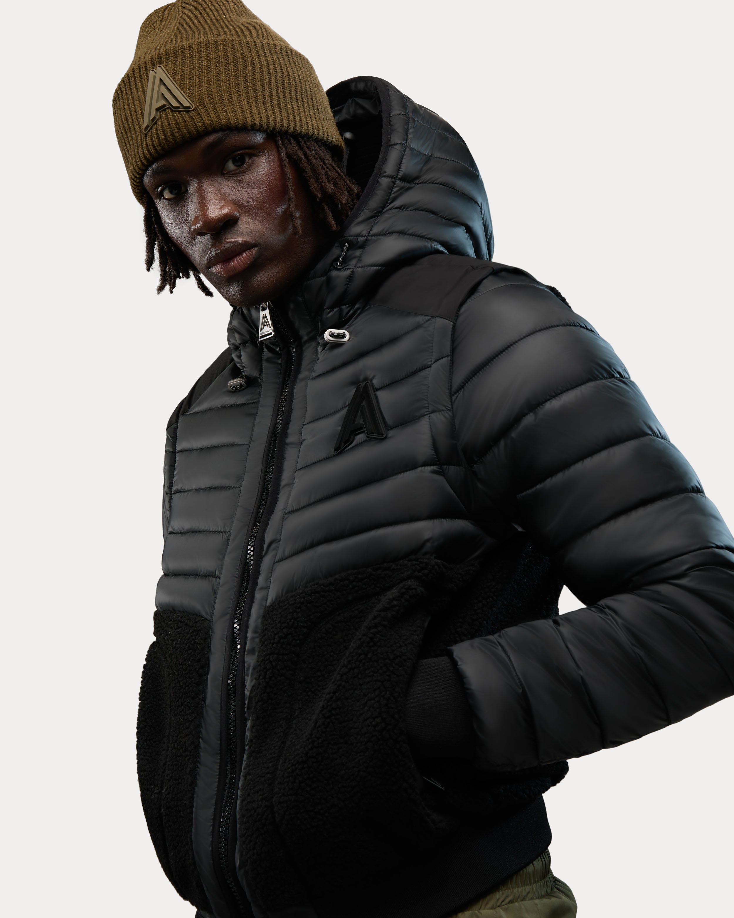 Manteau matelassé léger en matériaux assortis 2-en-1 Kirkjufell avec manches amovibles