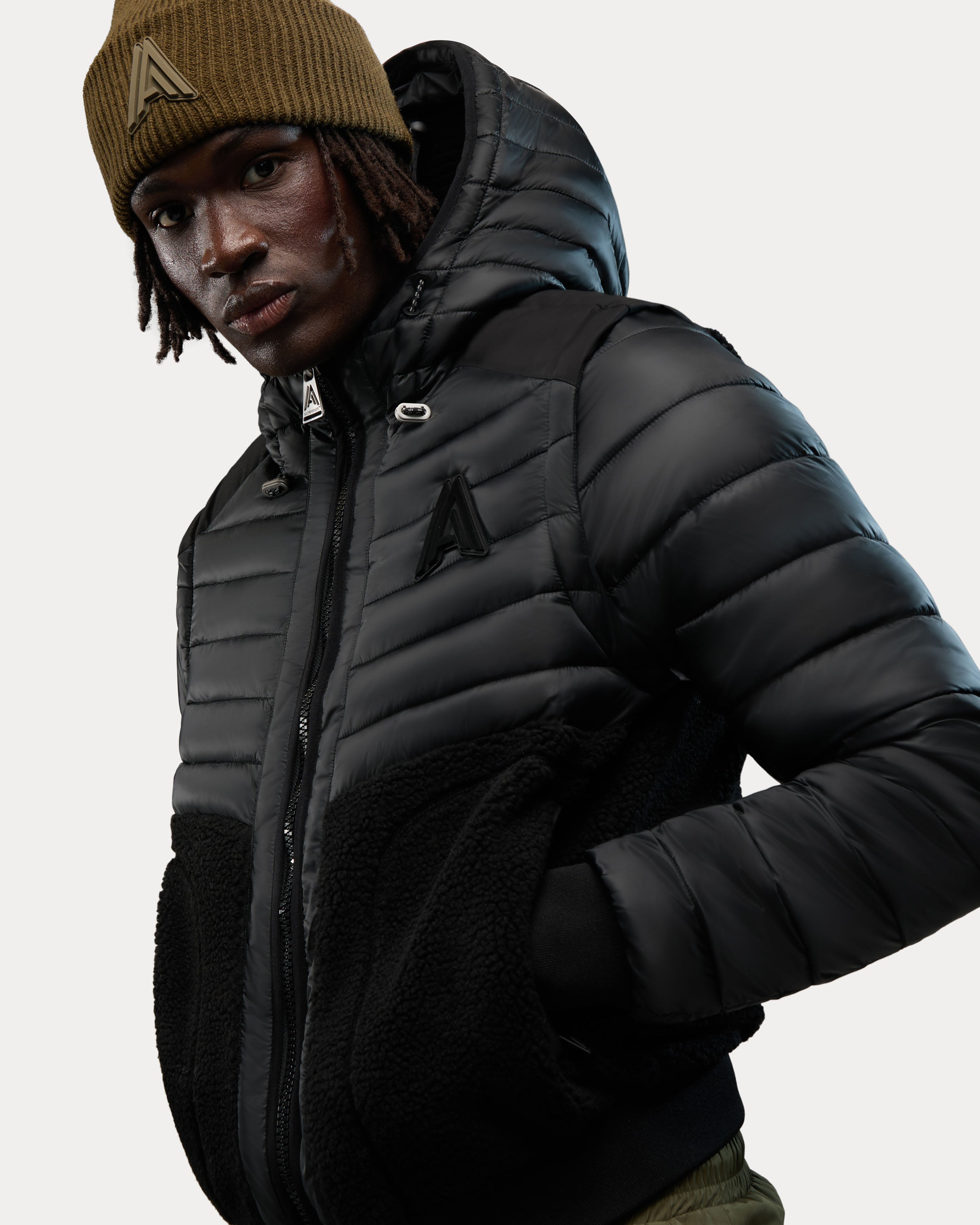 Manteau matelassé léger en matériaux assortis 2-en-1 Kirkjufell avec manches amovibles