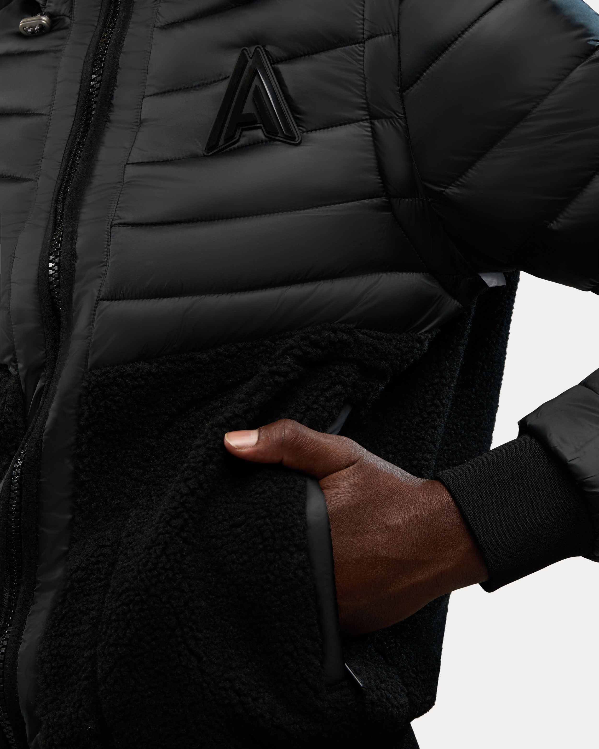 Manteau matelassé léger en matériaux assortis 2-en-1 Kirkjufell avec manches amovibles